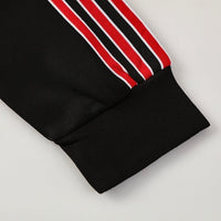 Manchester United -takki, verryttelypuku, 2025/26, punainen & musta