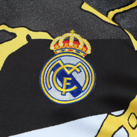 Real Madrid x MARVEL Vetoketjullinen Collegepuku (paita+housut) 25/26 Musta